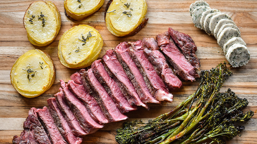 Bison Ribeye Steak with Herb Butter & Pommes Anna