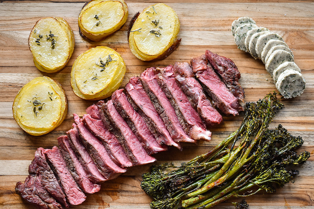 Bison Ribeye Steak with Herb Butter & Pommes Anna